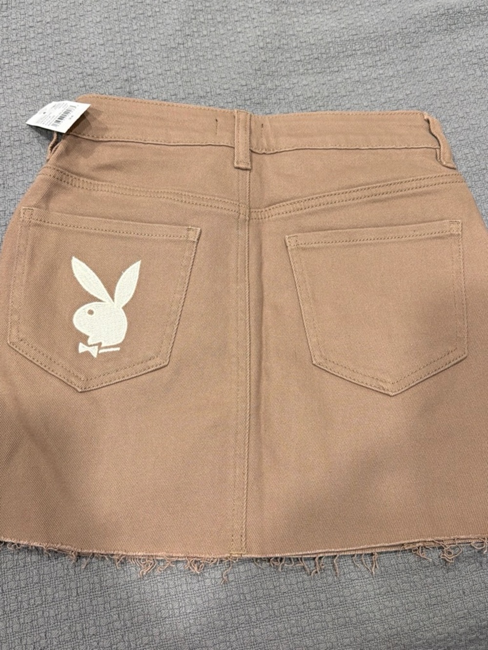 PLAYBOY Tan Mini Skirt with White Bunny Pocket